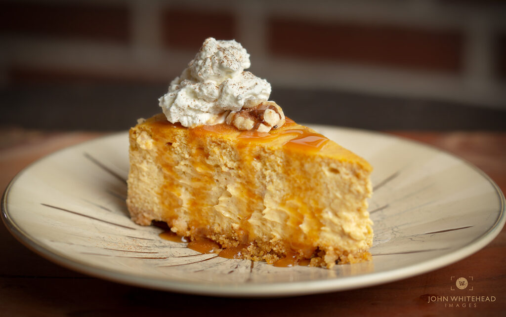 Pumpkin Cheesecake with caramel, and nut crust.