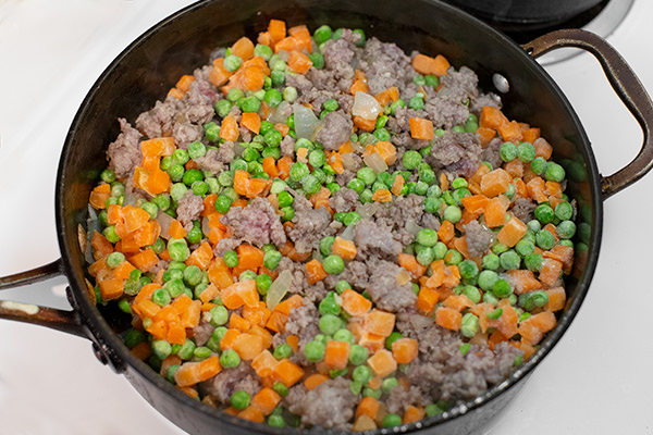 add vegetables for Shepherd's Pie filling.