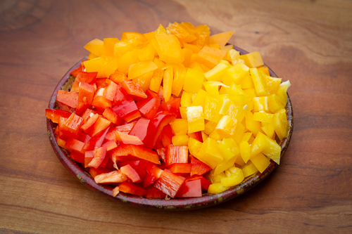 diced red and yellow peppers